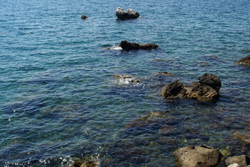 Rocky bay with giant boulders daytime