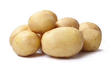 A heap or fresh potatoes isolated on white background.