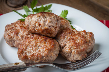 Meatball with parsley.