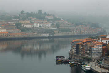 Fototapeta na wymiar Ribeira of Porto in the morning mist 