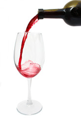 Pouring red wine into the glass