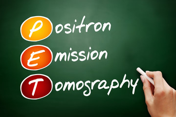 PET - Positron Emission Tomography acronym, health concept on blackboard