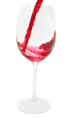 Pouring red wine into the glass