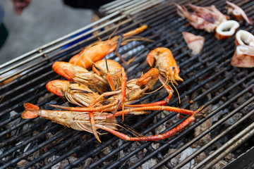 Grilled shrimps seafood on the table in market of Bangkok Thailand 