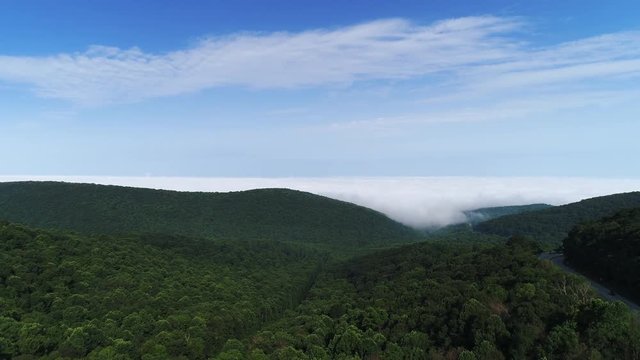 A foggy morning aerial view of a Pennsylvania Appalachian Mountain valley.  	