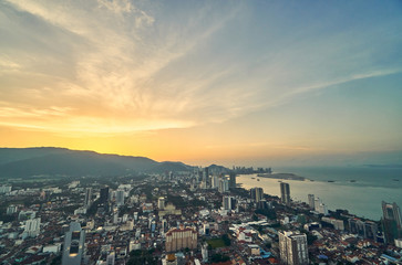 Panorama of city George Town, Malaysia on sunset background
