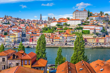 Porto, Portugal old town skyline from across the Douro River..Porto, Portugal old town skyline - obrazy, fototapety, plakaty