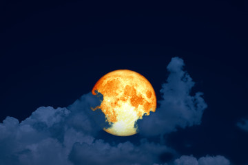 Obraz na płótnie Canvas full blood moon back over silhouette cloud night blue sky