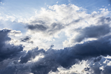 Naklejka na ściany i meble clouds on a blue sky close up - texture