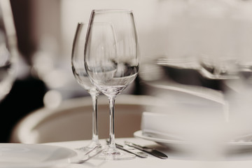 Table setting decoration. Table served with cutlery for romantic dinner or other event. Wedding decor. Banquet hall. Celebration concept