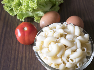 Macaroni, Fresh Egg and Lettuce Placed in Set To cook