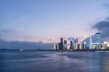 Fototapeta premium Night view of Modern Architecture City in Qingdao