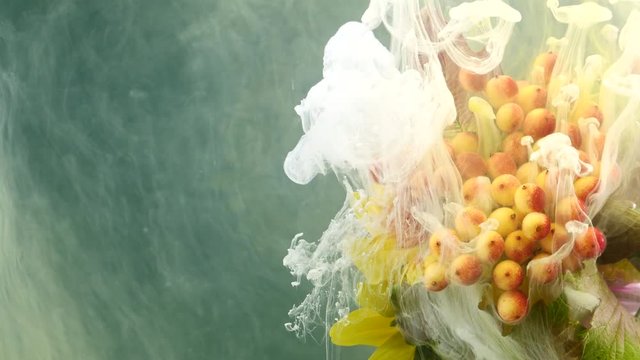 Amazing spreading of paint on beautiful autumn bouquet.