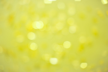 Obraz premium Yellow lights with blur. It looks like a holiday with serpentine, glow and brilliance.
