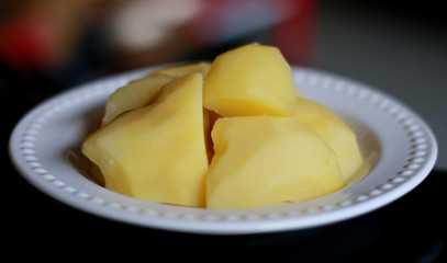 A plate of boiled potatoes. Healthy food.