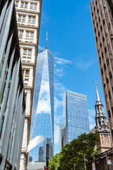 Low angle view of skyscrapers against blue sky in Financial Dist
