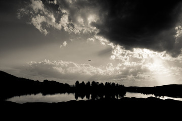 black and white landscape. Lake and clouds