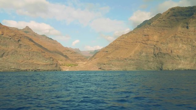 Opening view of ricky clove of Gran Canaria island. View from sailing yacht