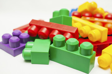 Children's game mechanic block for assembly of different buildings, designs on a white background