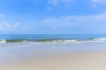 Fototapeta na wymiar Landscape of Sea sand with Blue sky and cloud on the beach.