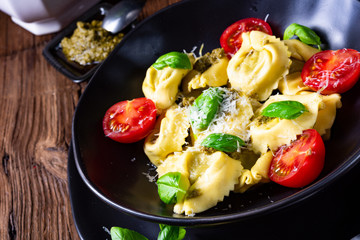rustic spinach tortellini with cheese and cocktail cocktail tomatoes