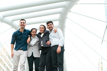 Business people team support unity arm around together at outdoors. Concept of teamwork, team success, people creative and power of group.