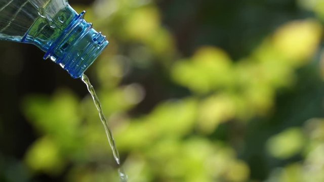 Drop a drop of water from an empty plastic bottle.