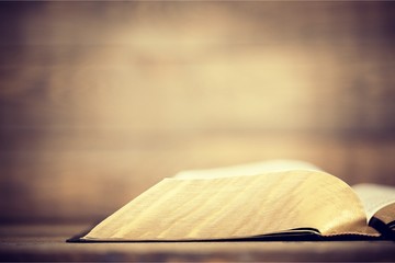 Holy Bible  book on a wooden background