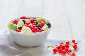 Fresh fruit salad. Close up. Light photo. Copy Space