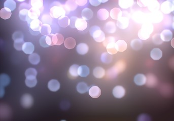 Bright lights defocused on black, dark background.