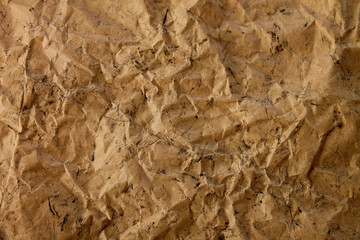 Kraft paper is brown and crumpled texture.