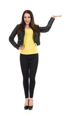 Young Woman In Black Leather Jacket, Leggings And High Heels Is Presenting