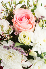 Beautiful bouquet with roses and small decorative flowers