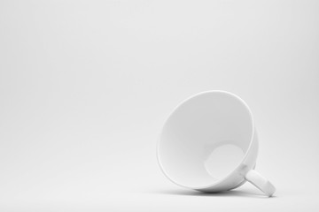 White ceramic cup on a white background