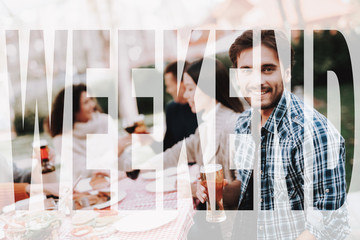 Young Male With A Bottle Of Beer On Barbeque.