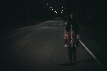 Portrait of asian woman make up ghost face,Horror scene,Scary background,Halloween poster