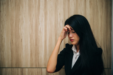 Close up sad woman in the office,stress girl from hard work,Heartbreak from boyfriend,Thailand people