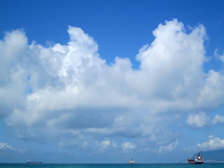 blue sky in white clouds over the sea