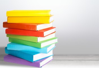 Colorful books collection on desk