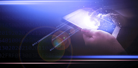 A tablet in the hands of a man, Neon glow of the screen. A dark background, close-up. Additional reality, holographic display, rays of light, magic.