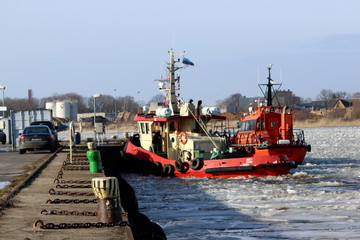 Fototapeta premium ice breacker ship in frozen river in pärnu, estonia