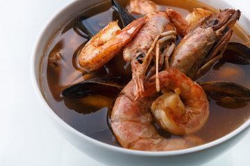 Seafood soup. Shrimp. Mussels. The scallop. On a white background