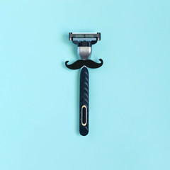 November is season of mustaches. Razor with mustache