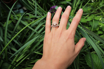 Obraz premium Close up of beautiful woman wearing shiny ring