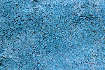 Blue surface of an old iron paint with three dimensional cubes of blue