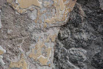 The texture of weathered stone wall