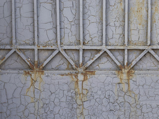 old cracked metallic gray fence