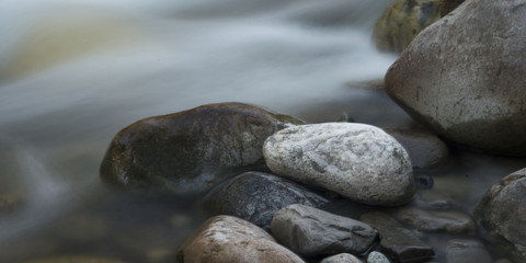 Stream flowing through rocks, Whistler, British Columbia, Canada