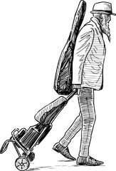 An elderly musician on a trip
