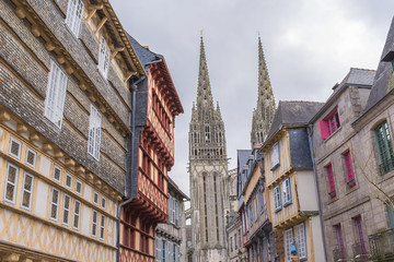 Quimper in Brittany, the Saint-Corentin cathedral, medieval street 
